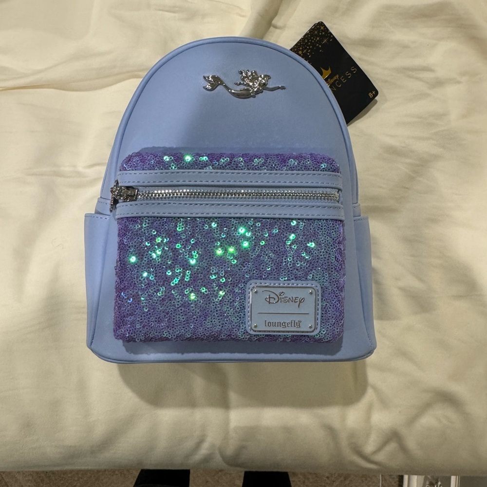 Loungefly Light Blue Mini Backpack with Purple Sequin Pocket